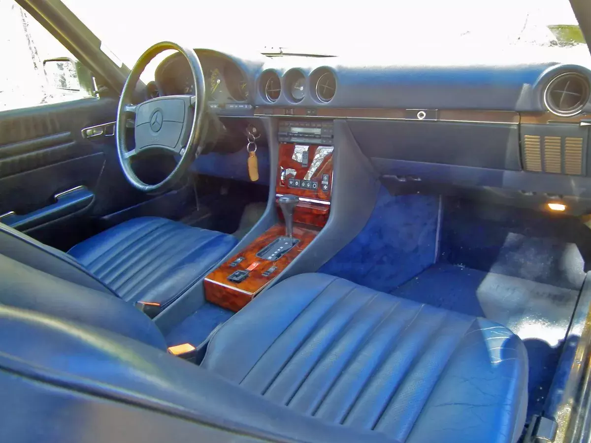 With extensive literature (photo), spare tire and soft top thought original. 1987 Mercedes-Benz SL-Class