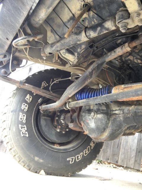 XJ hard Top with Spring over axle lift and AC. Runs but is non op title. 1986 Suzuki Samurai XJ