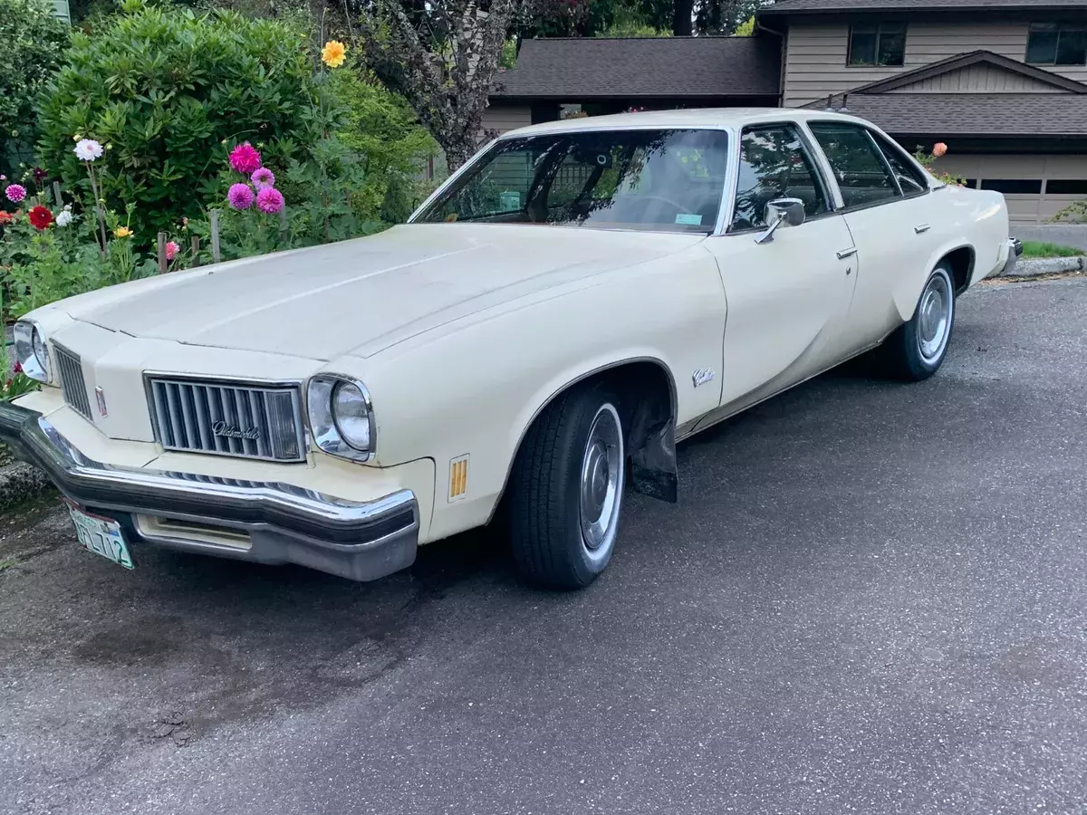 Yellow 1975 Oldsmobile Cutlass 4-dr V8 260 1975 Oldsmobile Cutlass