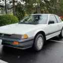 1.8L 100hp14 engine. 5 speed manual. 2 DR STD Coupe.