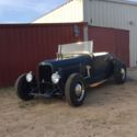 1928 Ford Model A Roadster on 32 Ford rails.