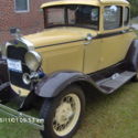 1931 Model A coupe deluxe with rumble seat.  4 cylinder.