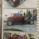 1932 Ford Coupe , ( 2003 ) Anniversary Corvette Red in color