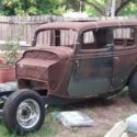1934 Ford 4 door sedan with rolling chassis (optional parts)