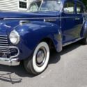 1940 4-door Blue Chrysler New Yorker with Suicide Doors