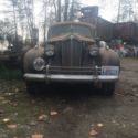 1940 Packard 160 Super 8 sedan with dual side mounts