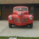 1940 Plymouth Coupe. Look close. Much prettier than a Ford or Chevy & more rare.