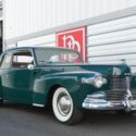 1942 Lincoln Continental Coupe, Green on tan, gold trim package.