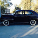 1947 Maroon Ford Tudor in excellent condition with original flathead V8