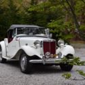 1951 MGTD. White with red leather. Restored