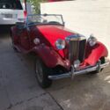 1953 MG Roadster Convertible RWD Manual, not a reproduction but the “real deal.”