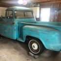 1956 Chevy pickup truck with big back window and deluxe trim