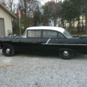 1957 Black and White Chevrolet Taxi 4 door 150 Sedan