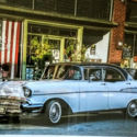 1957 Chevrolet Bel Air 4 Door Sport Sedan. White w/ black top and chrome details