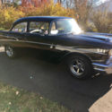 1957 chevy belair black 2 door post with 283 Power Pack Heads