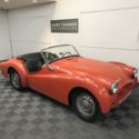 1957 TRIUMPH TR3 SPORTS ROADSTER. ORIGINAL BLACK WITH RED TRIM FACTORY COLORS.
