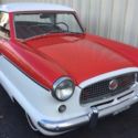 1958 Nash Metropolitan  0 Red & White 2DSD 4 Cylinder Manual