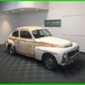 1958 VOLVO P444 SPORTS COUPE. WHITE ON RED. 3-SPEED MANUAL. NICE ORIGINAL CAR.
