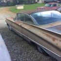 1960 buick long and low fins