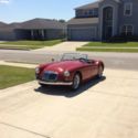 1960 MGA...car is RED ( not black)