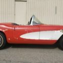 1961 CHEVROLET CORVETTE CONVERT 327 WITH DUAL QUADS.  ROMAN RED WITH WHITE COVES