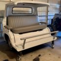 1962 Corvair ramp side pick up couch. Has wheels for easy moving.