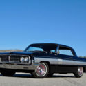 1962 OLDSMOBILE STARFIRE 394 V8 BLACK ON RED BUCKETS CONSOLE SELLING NO RESERVE