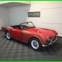 1962 TRIUMPH TR-4 CONVERTIBLE. RED WITH BLACK TRIM. 4-SPEED. MATCHING NUMBERS