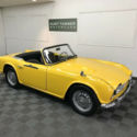 1962 TRIUMPH TR-4 ROADSTER. YELLOW WITH BLACK TRIM. 4-SPEED. PAINTED DASH CAR.