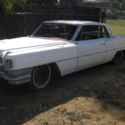 1964 CADILLAC CDV. FACTORY SILVER CAR WTIH RED BUCKET SEAT INTERIOR. LOADED