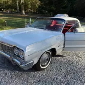 1964 Chevrolet Impala 2-door hardtop with 327 Powerglide. Original condition.