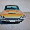 1964 Ford Thunderbird, original title, 77,000 miles 390 engine, color: gold