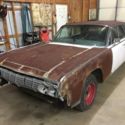 1964 Lincoln Continental - 430V8 Arctic White w/Black Leather Suicide Doors
