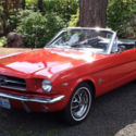 1964 ½ Mustang convertible, Rangoon red, with power steering.