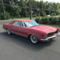1965 Buick Riviera  425 dual quad Flame red with Deluxe Black interior