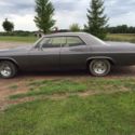 1965 chevrolet impala 4 door Hardtop. No post between doors. Runs and drives