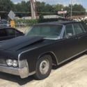 1965 Lincoln Continental hardtop sedan with suicide doors