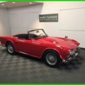 1965 TRIUMPH TR-4 SPORTS CONVERTIBLE. RED ON BLACK. 4-SPEED W/OD. GREAT DRIVER.