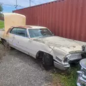 1966 Cadillac Coupe DeVille V8 w/3-Speed Automatic.