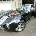 1966 Cobra, West Coast Dreams kit car, black/silver stripe, 460 engine, 5 spd.
