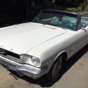 1966 convertible Ford Mustang white with teal interior power steering and brakes