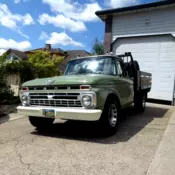 1966 Ford F250 351 C 4 BBL 4 speed PS restored with PRO flat bed.