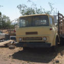 1966 GMC COE cabover flatbed truck with hydraulic lift