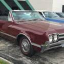 1966 Oldsmobile Cutlass  0 Burgundy Convertible V8 5.5L Automatic