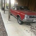 1966 Pontiac GTO, 4 speed, tri powered