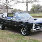 1966 Pontiac Lemans GTO. 389 V-8 4 speed manual, 4 wheel disc brakes, power top