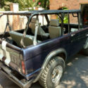 1967 Bronco, 6-point cage, bikini top, 6-ton winch, new seats.