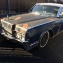 1967 Lincoln continental convertible (suicide ) !!