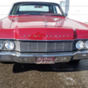 1967 Lincoln Continental, Red, suicide doors, unrestored in excellent condition.