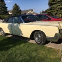 1967 Yellow Lincoln 4 Door Convertible with new black top only 130,000 milage